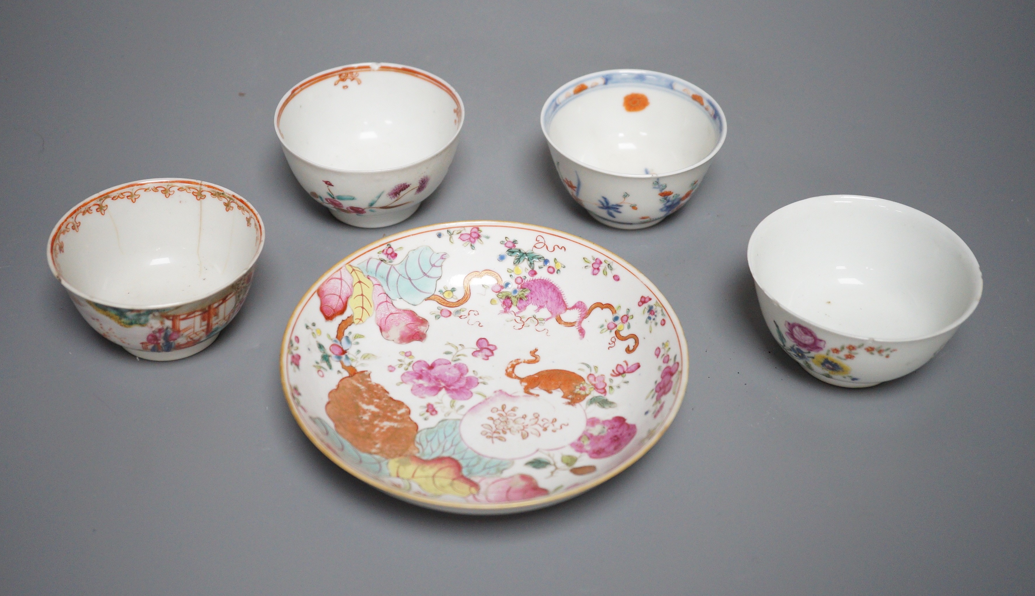 A 19th century Chinese Tobacco Leaf pattern saucer and four various teabowls